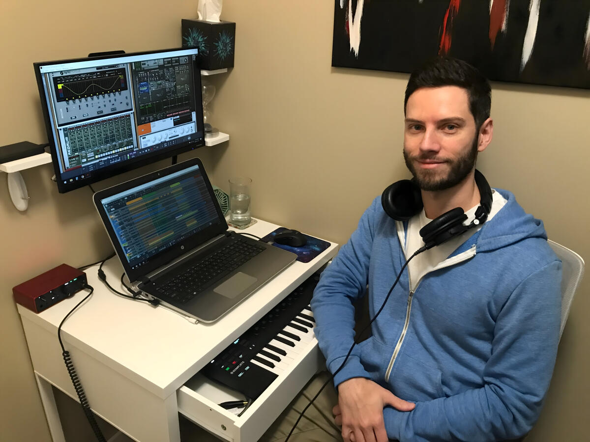 Eric sat at his desk